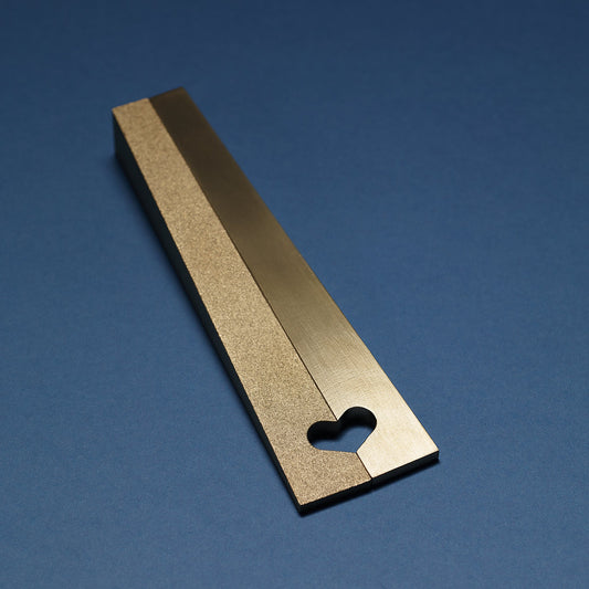 Aaron Probyn Barbican bottle opener, sleek barware tool with ergonomic handle for opening bottles easily, shown on a neutral background.