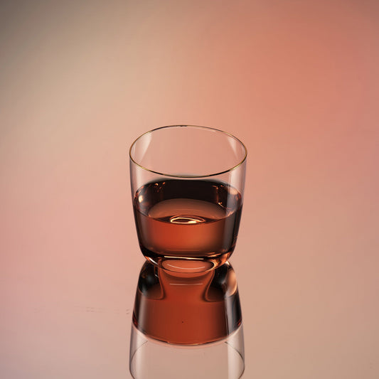 Set of two Aaron Probyn COVE glass tumblers with clear, modern design, perfect for beverages in a stylish home setting.
