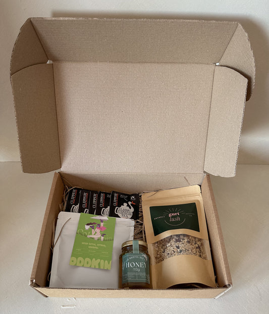 Bristol breakfast hamper from Gurt Lush Food Co featuring assorted breakfast treats and snacks in a stylish gift basket.