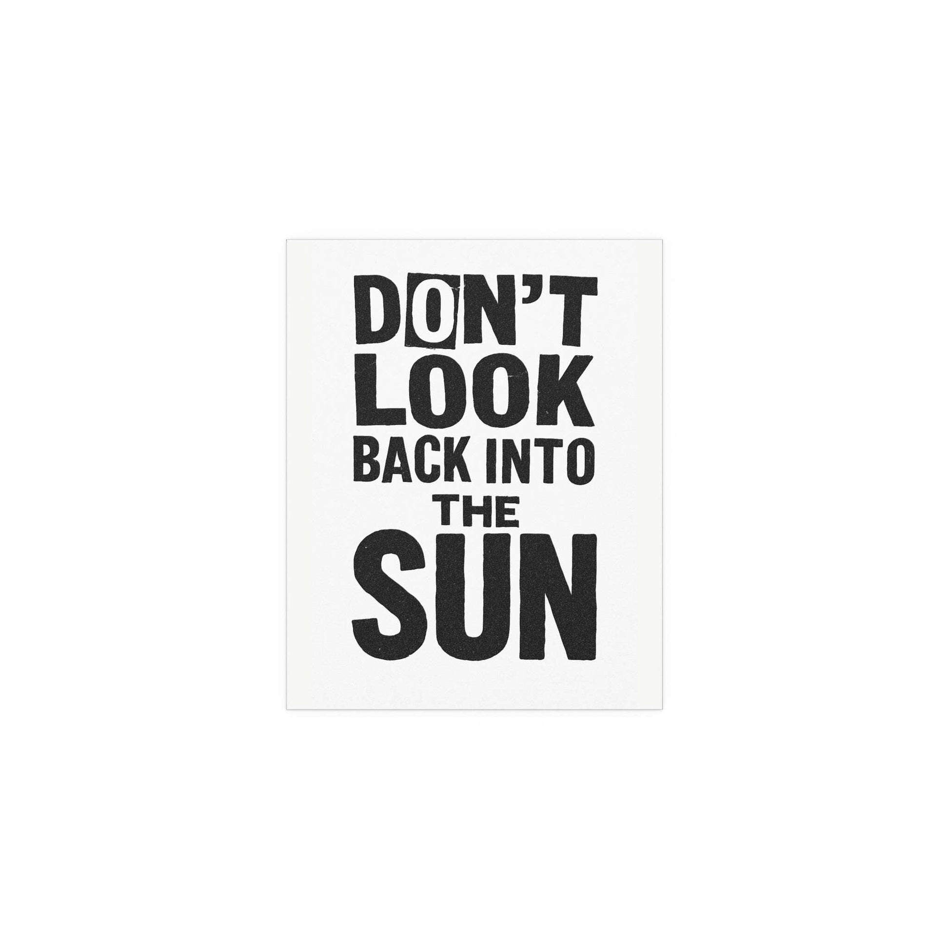 Poster of The Libertines' "Don't Look Back Into The Sun" in white and black, featuring band artwork on a Glow On Prints poster.