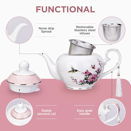 Pink London Boutique teapot with floral bird and butterfly design, 700ml capacity, infuser for loose tea, easy grab handle.