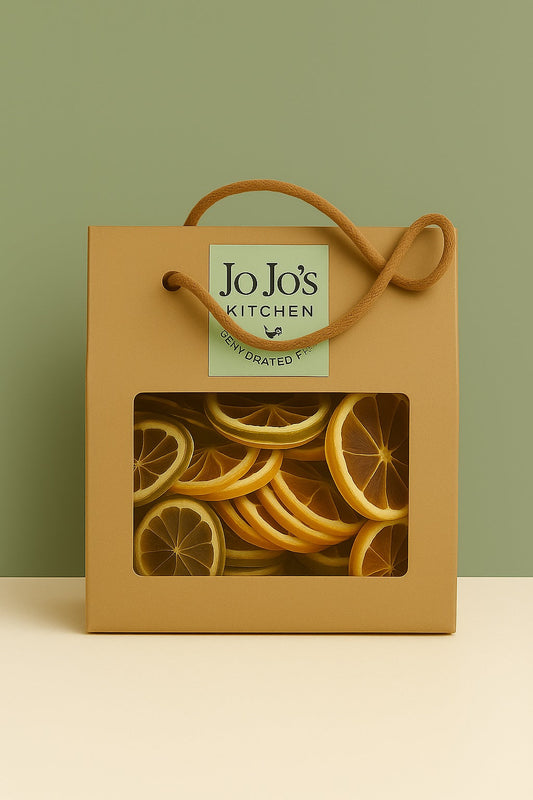 JoJo’s Kitchen Citrus Mix large box with a variety of fresh citrus fruits on a wooden surface