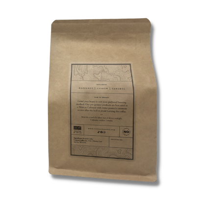 Single Origin Honduras SHG coffee beans from Contact Coffee Company Ltd. displayed in a clear image.