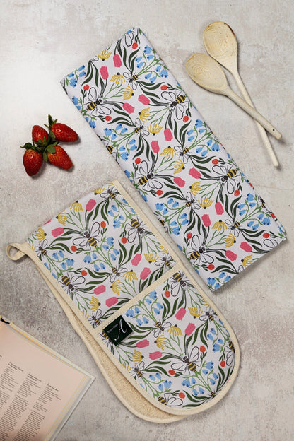 British Bees oven gloves from Avalon Home UK, showcasing a flat lay of bee-themed heat-resistant kitchen gloves.
