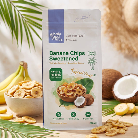 Sweetened banana chips from Whole Food Earth, dried fruit snack with golden banana slices on a neutral background.