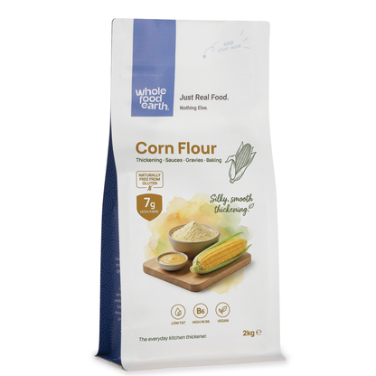 Whole Food Earth corn flour from Serious Grains, fine yellow cornmeal for baking and cooking, in a packaging shot.
