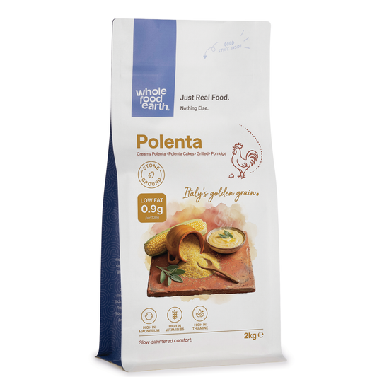 Golden artisanal Polenta from ArtisanBox, showing a close-up of the textured cornmeal in a bowl.