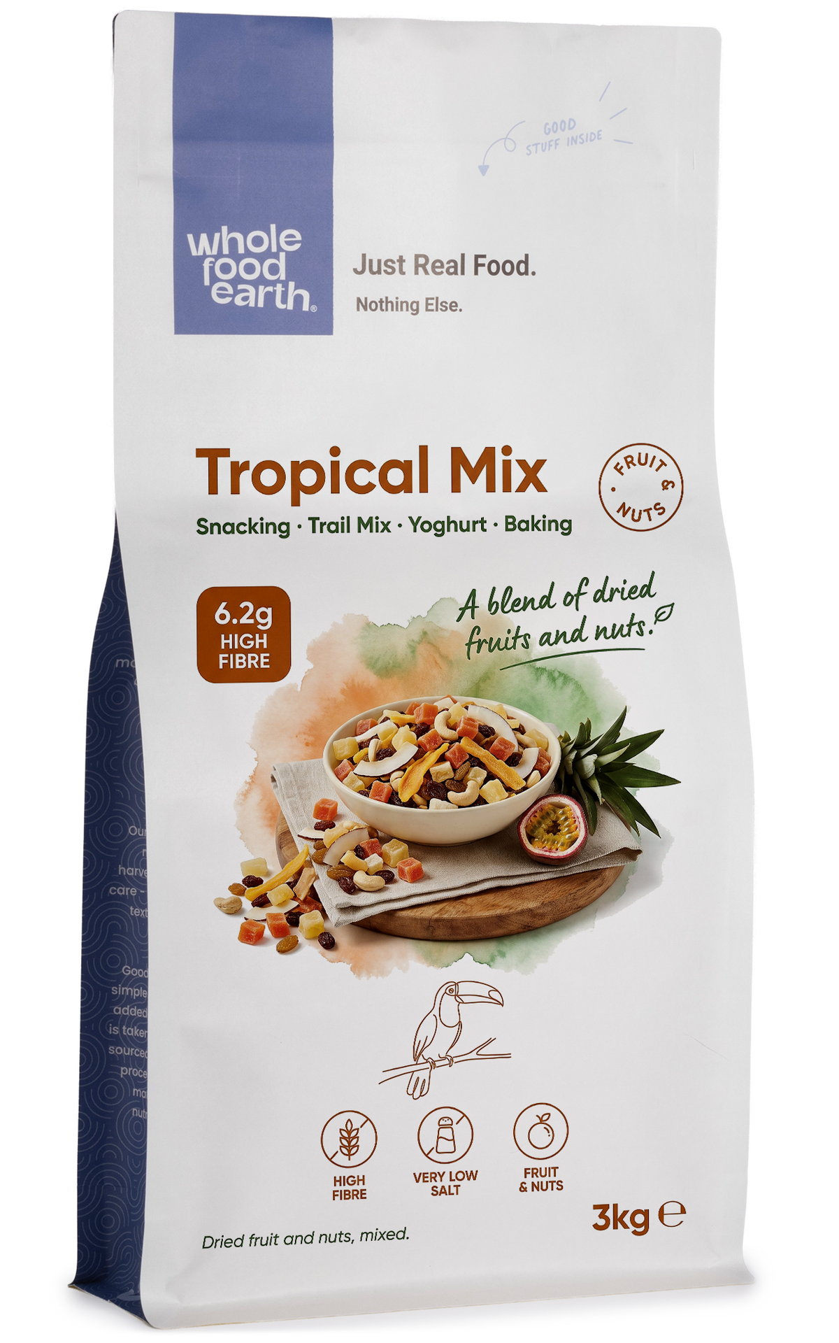 Assorted dried fruits and nuts in tropical mix, Whole Food Earth specialty blend in a colorful package.