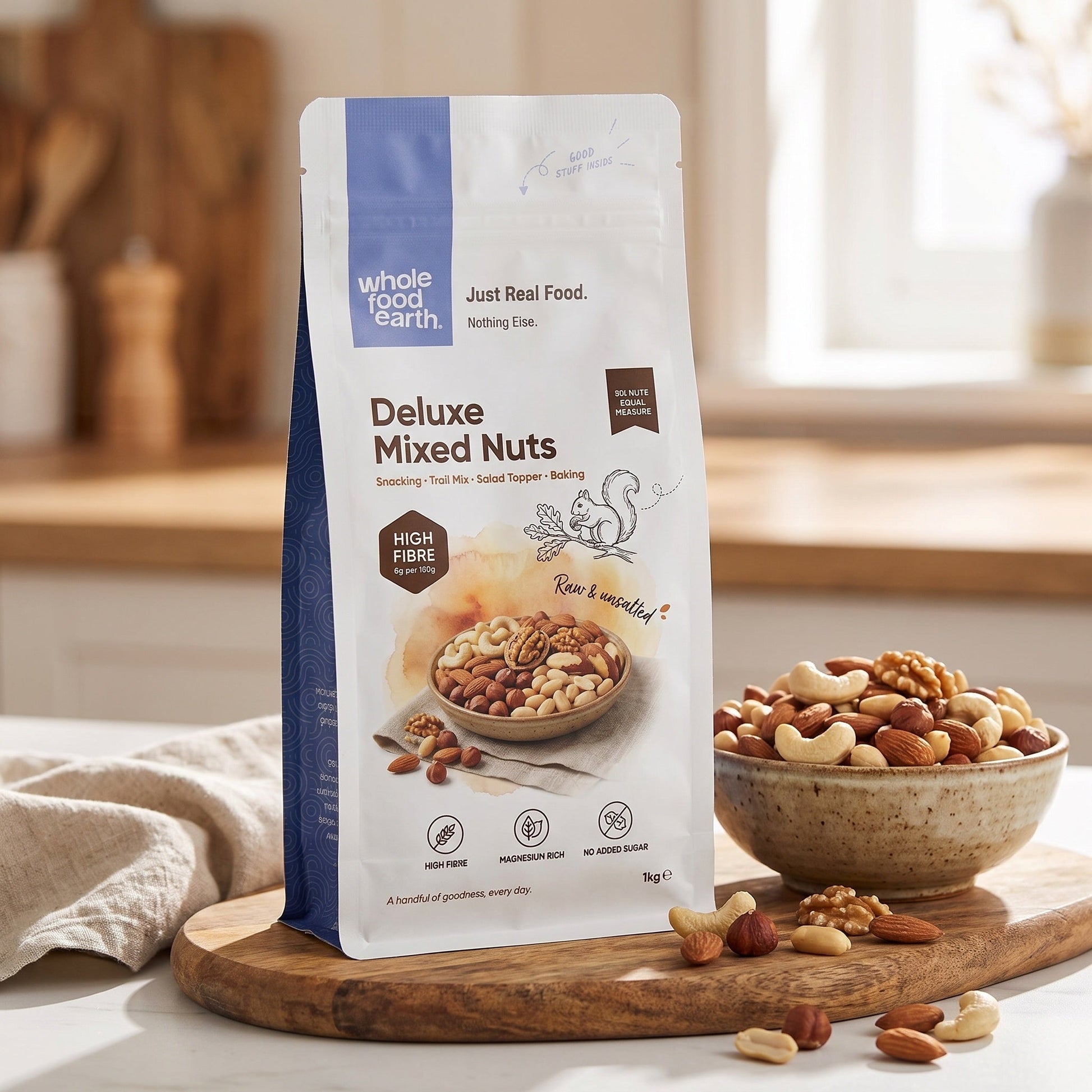 Mixed nuts in a bowl featuring Whole Food Earth Deluxe Mixed Nuts, a specialty snack with almonds, cashews, and walnuts.