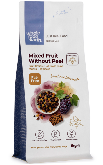 Dried mixed fruit without peel from Whole Food Earth, showcasing a colorful assortment of dried fruits on a white background.