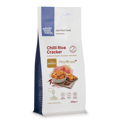 Whole Food Earth chilli rice cracker, specialty snack with vibrant red chili seasoning, crispy texture, and rice base.