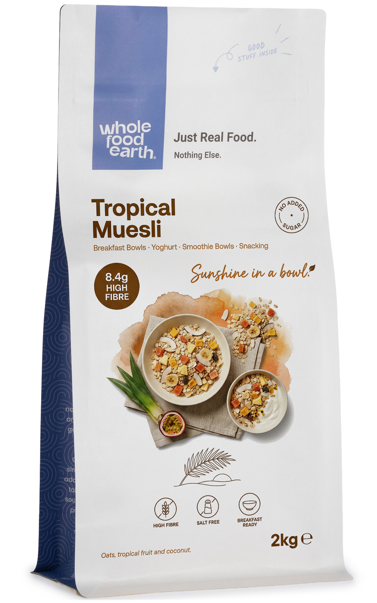 Whole Food Earth Tropical Muesli cereal with flakes, dried fruit, and nuts in a colorful bowl.