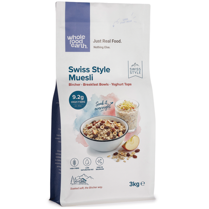 Whole Food Earth Swiss Style Muesli cereal with flakes, dried fruit, and nuts in a bowl, showcasing a healthy breakfast mix.