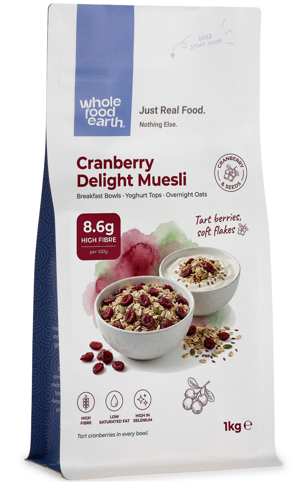 Whole Food Earth Cranberry Delight Muesli cereal with flakes, dried cranberries, and mixed seeds in a bowl.