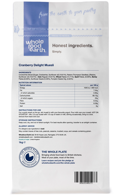 Whole Food Earth Cranberry Delight Muesli cereal showing flakes, cranberries, and seeds in a natural, colorful breakfast bowl.