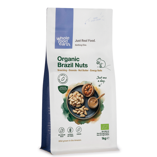 Whole Food Earth whole Brazil nuts in the shell, showing their large, wrinkled brown exterior and natural nut appearance.