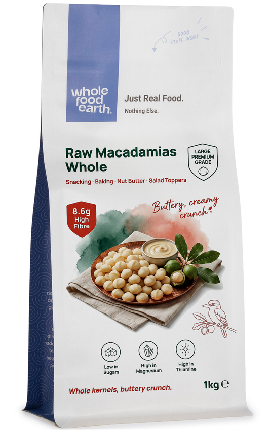 Whole Food Earth raw macadamias whole nuts, large premium grade, in natural light with a close-up view of the creamy, crunchy nuts.