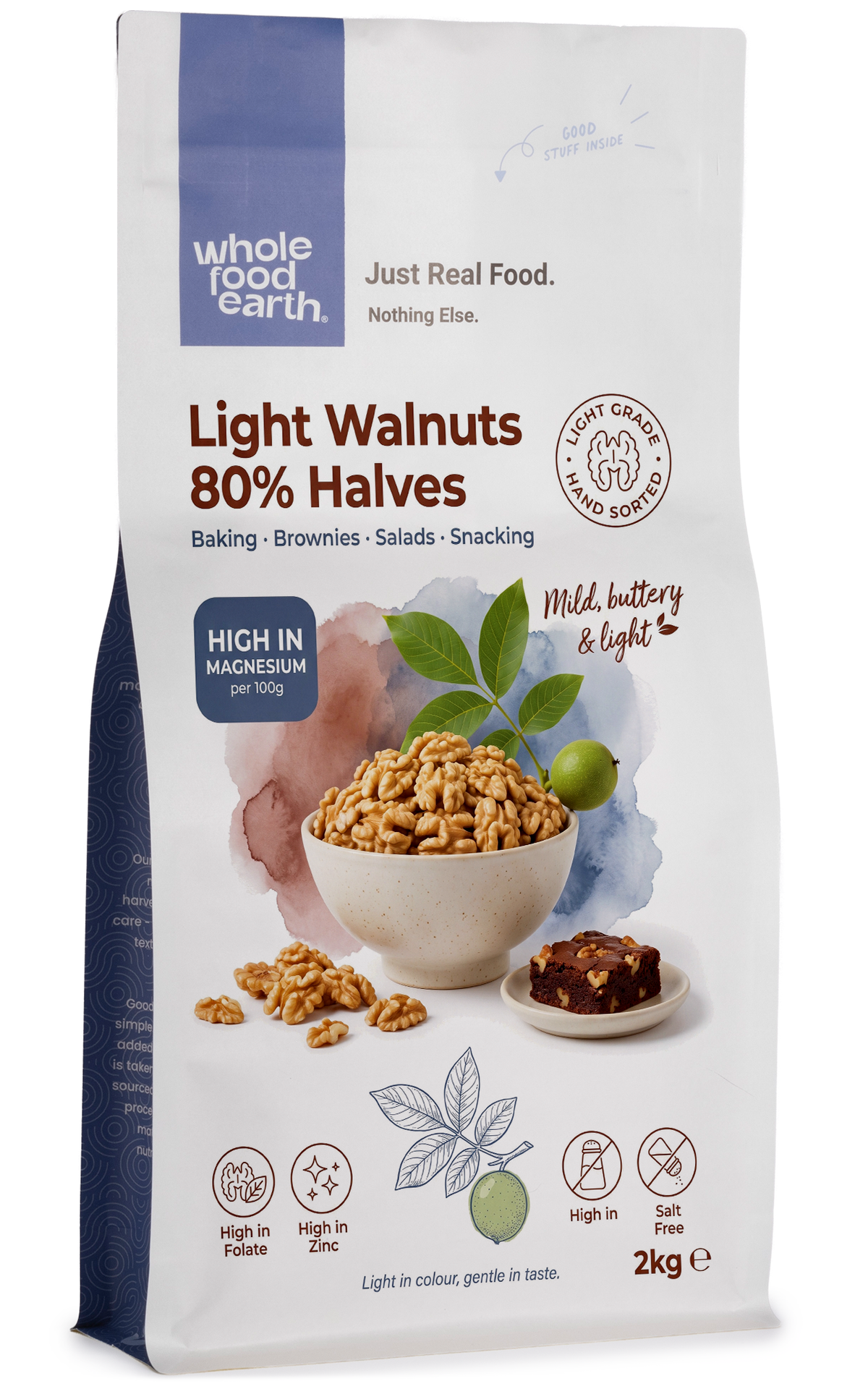Light walnuts in 80% halves, Whole Food Earth nuts and seeds product, showing fresh, crunchy walnut halves in a natural setting.