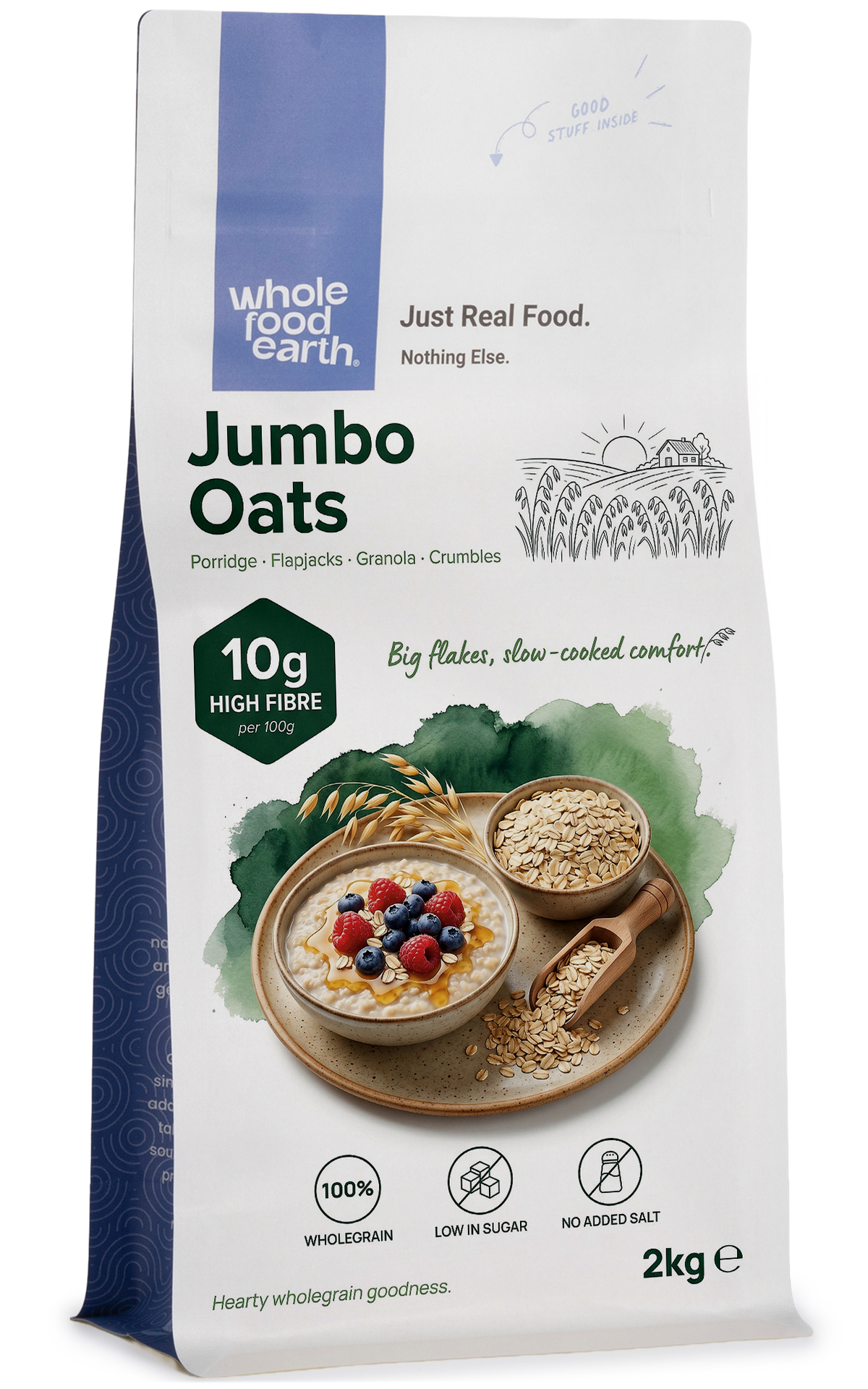 Whole Food Earth Jumbo Oats cereal in a bowl, close-up of textured oats with a spoon on a wooden surface.