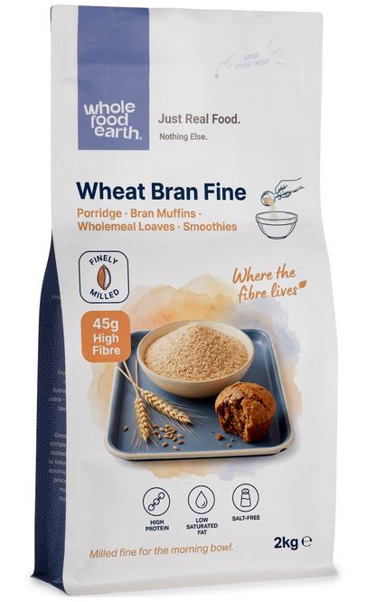 Fine wheat bran cereal from Whole Food Earth, showing a close-up of the textured, light brown wheat bran in a natural setting.