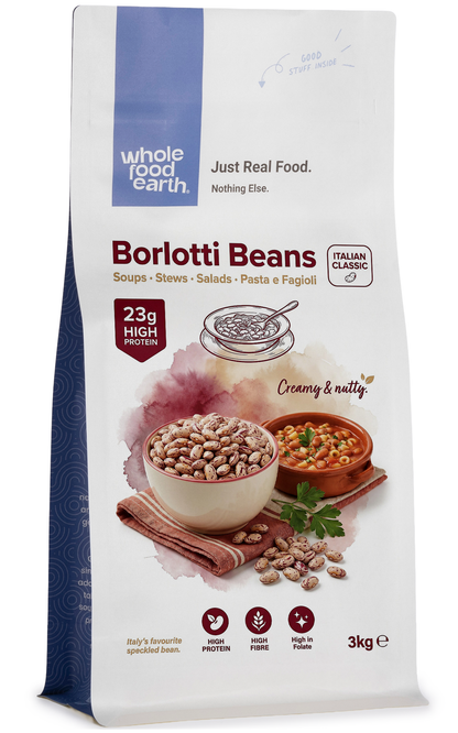 Whole Food Earth Borlotti Beans in a bowl, showing their reddish-brown color and smooth, oval shape, for beans and pulses.