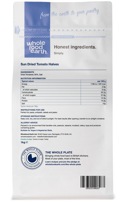 Sun dried tomato halves from Whole Food Earth, dried fruit product, showing vibrant red, wrinkled tomato halves on a white background.