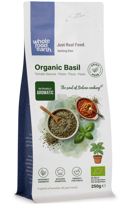 Fresh organic basil herb from Whole Food Earth, vibrant green leaves ideal for cooking and garnishing.
