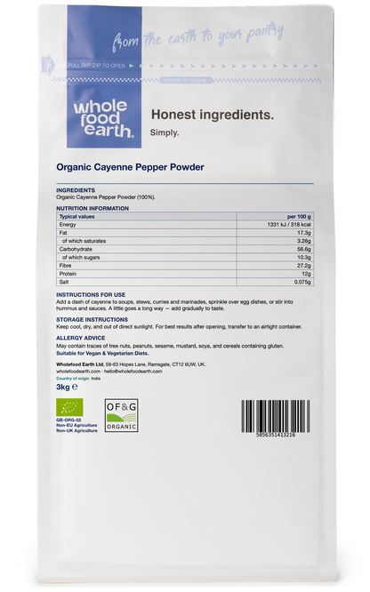 Organic cayenne pepper powder in a jar from Whole Food Earth, showing vibrant red spice with a label and a clear view of the product.