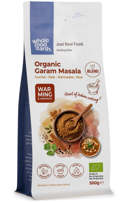 Organic Garam Masala spice blend from Whole Food Earth, featuring a colorful mix of ground herbs and spices in a jar.