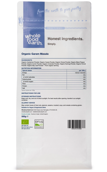 Organic Garam Masala herbs and spices blend in a clear jar from Whole Food Earth, showing a colorful mix of ground spices.