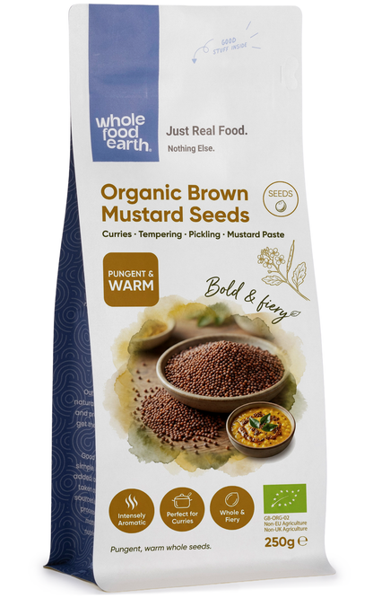 Organic brown mustard seeds in a jar from Whole Food Earth, showcasing small, round, brown spice seeds for cooking and seasoning.