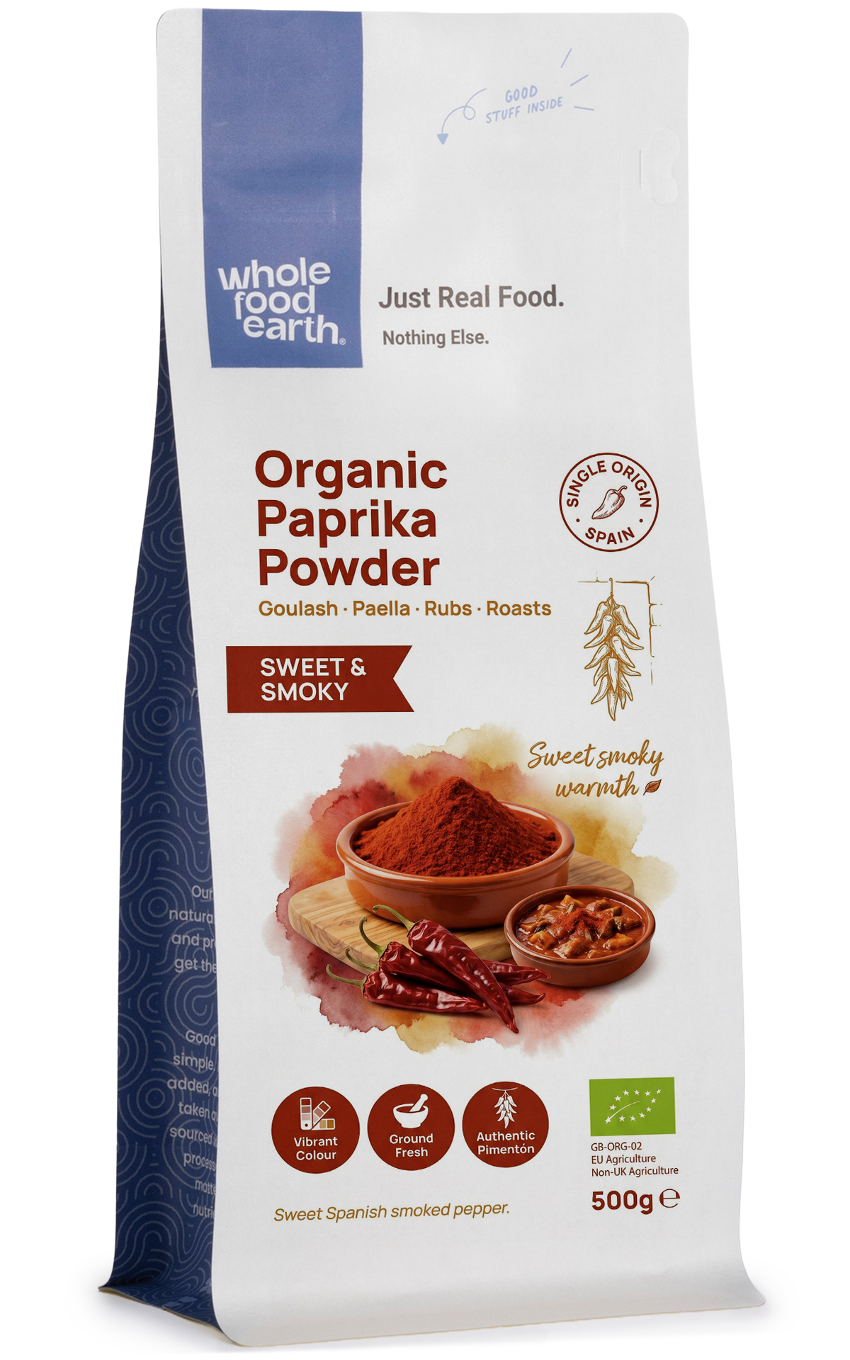 Organic paprika powder in a clear jar, vibrant red herb and spice from Whole Food Earth for cooking and seasoning.