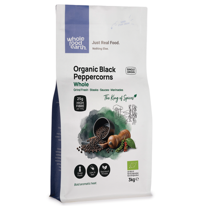 Whole Food Earth organic black peppercorns, whole herbs and spices in a clear container, ready for seasoning and cooking.