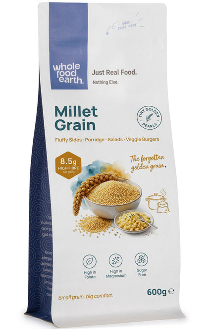 Whole Food Earth millet grain in a bowl, showcasing small yellow millet seeds for healthy cooking and baking.