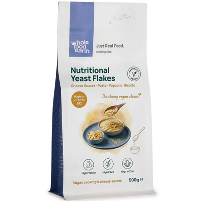 Nutritional yeast flakes with B12 from Whole Food Earth, shown in a 3D rendering, ideal for adding savory flavor to dishes.