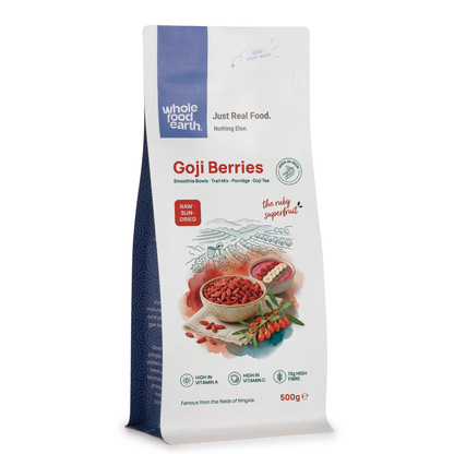 Dried goji berries from Whole Food Earth, a nutritious natural fruit snack with vibrant red-orange color and wrinkled texture.