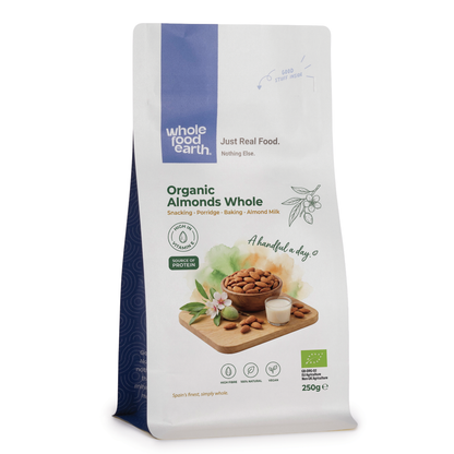Whole Food Earth Organic Almonds, whole nuts in natural light, showcasing their brown, textured shells and fresh appearance.