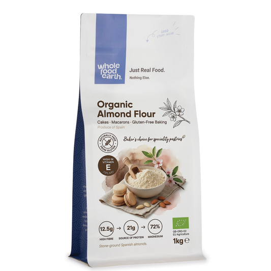 Organic almond flour from Whole Food Earth, finely ground nut powder in a clear bag on a white background.