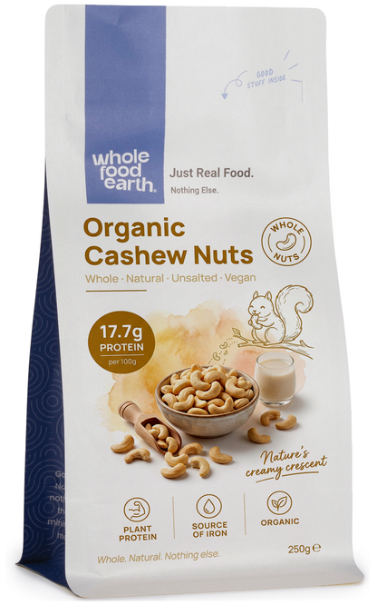 Whole Food Earth organic whole cashew nuts, showing their creamy, curved shape and light beige color on a neutral background.