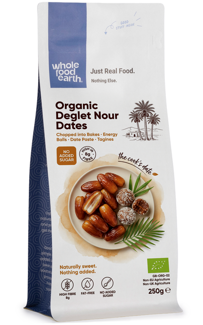 Organic Deglet Nour dates from Whole Food Earth, pitted dried fruit with shiny, caramel-colored dates on a white background.