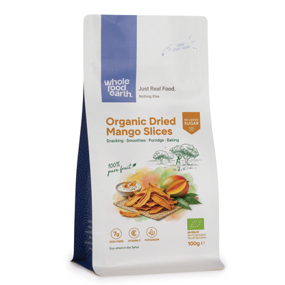 Organic dried mango slices from Whole Food Earth, showcasing vibrant orange, chewy dried fruit pieces on a white background.