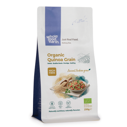 Organic quinoa grain from Whole Food Earth, showing a close-up of light tan quinoa seeds in a bowl on a wooden surface.