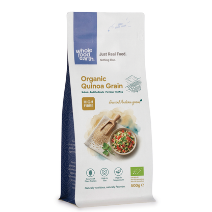Organic quinoa grain from Whole Food Earth, showing light-colored, uncooked quinoa seeds in a clear container.