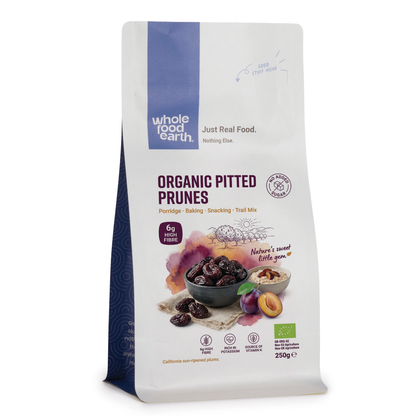 Organic pitted prunes from Whole Food Earth, dried fruit with smooth, dark, and plump appearance.