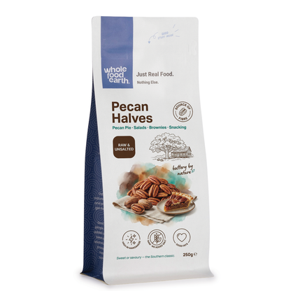 Whole Food Earth pecan halves, crunchy nuts and seeds in a natural light, showing the smooth, halved pecans ready to eat.