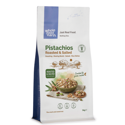 Roasted and salted pistachios from Whole Food Earth in a bowl, showcasing their crunchy texture and salted flavor.