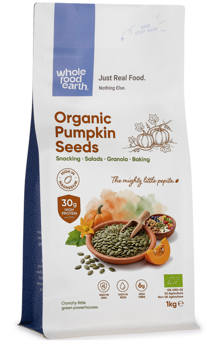 Organic pumpkin seeds from Whole Food Earth, GWS AA Austria, shown in a natural close-up view of the nut and seed package.