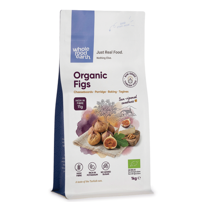 Dried organic figs from Whole Food Earth, close-up of textured, rich brown dried fruit with natural wrinkled skin.