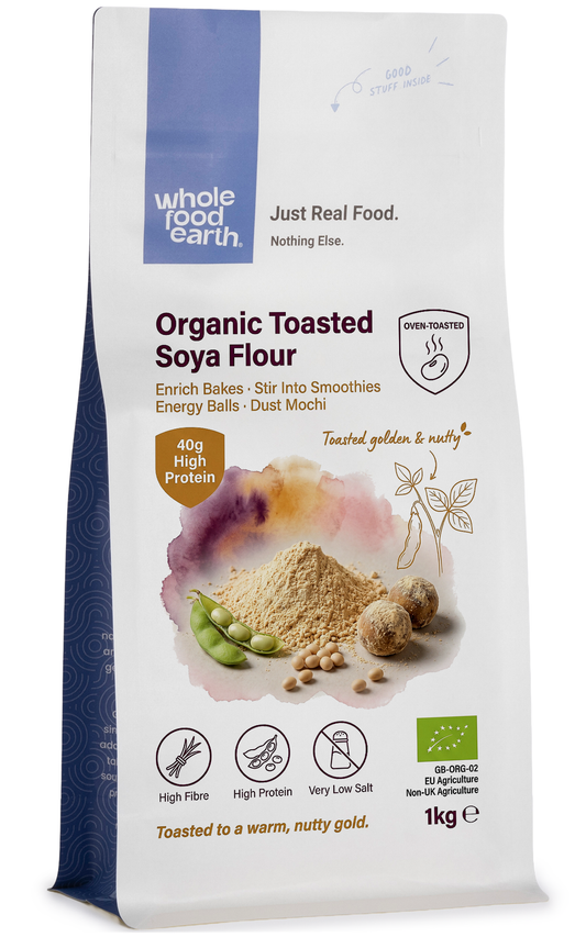 Organic toasted soya flour from Whole Food Earth, showing a close-up of the golden, textured flour in a bowl.