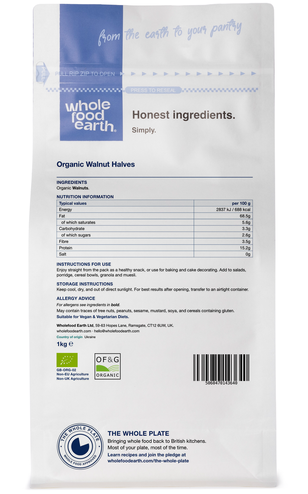 Back view of Whole Food Earth organic walnut halves in a clear container, showcasing their natural, crunchy texture and rich color.